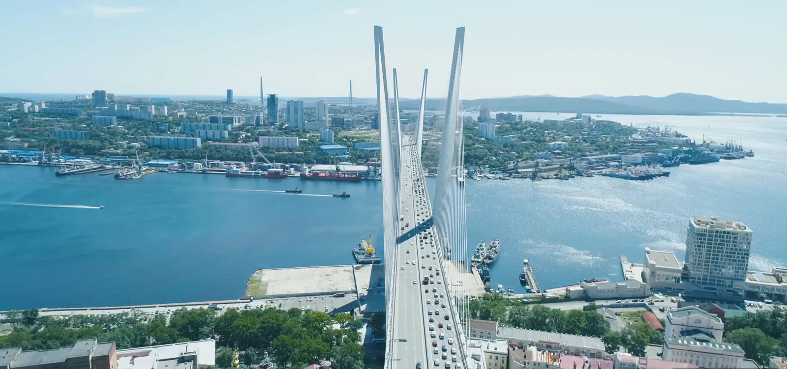 Cable-stayed bridge spanning a bay at sunrise